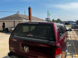 Used Topper - 2019-2026 Ram 1500 5.7 ft bed - Delmonico Red